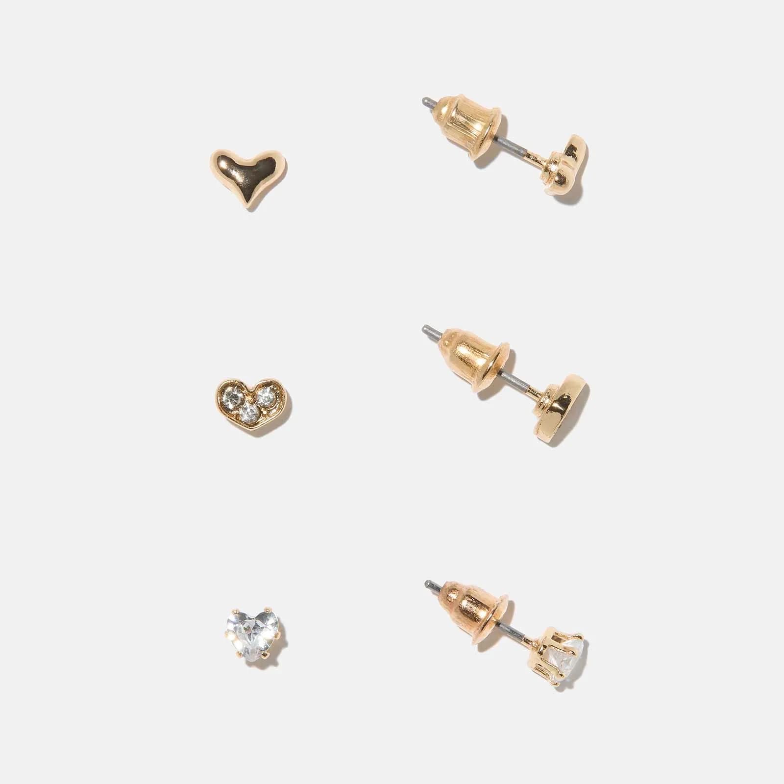 Guldfärgade örhängen - 3-pack studs, hjärtan