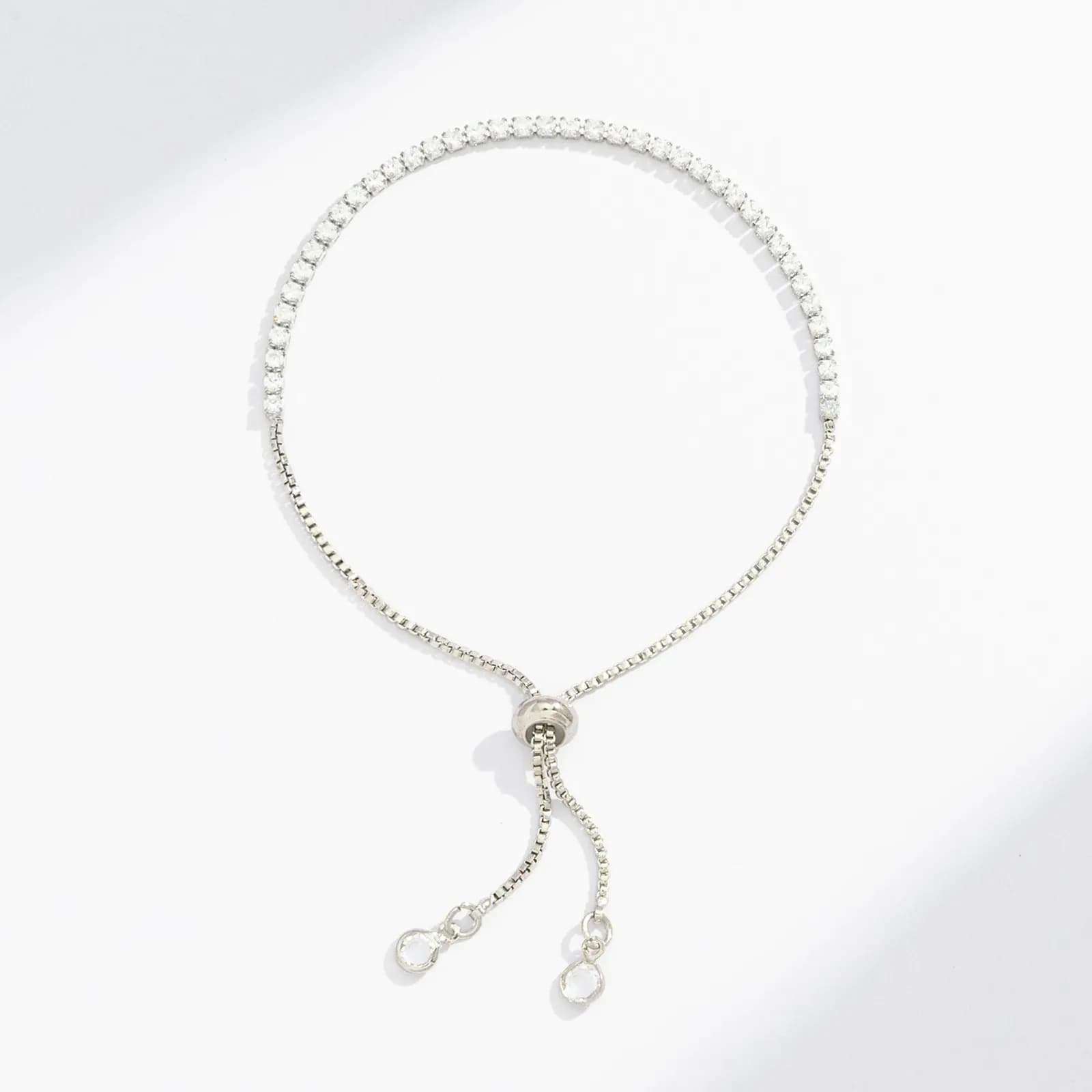 Silverfärgat tennisarmband, klara glasstenar - Justerbar