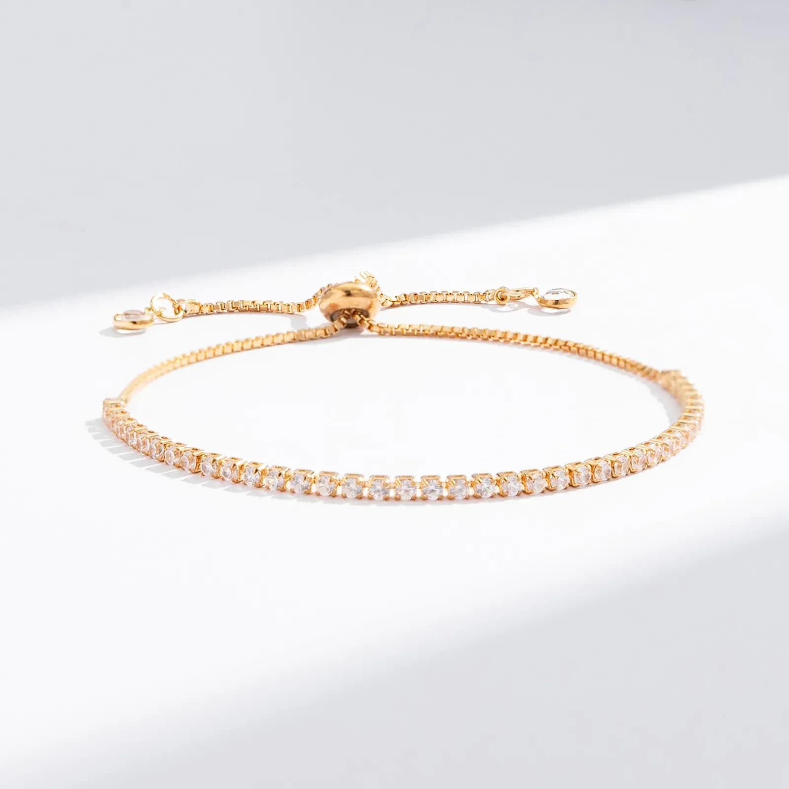 Guldfärgat tennisarmband, klara glasstenar - Justerbar 2
