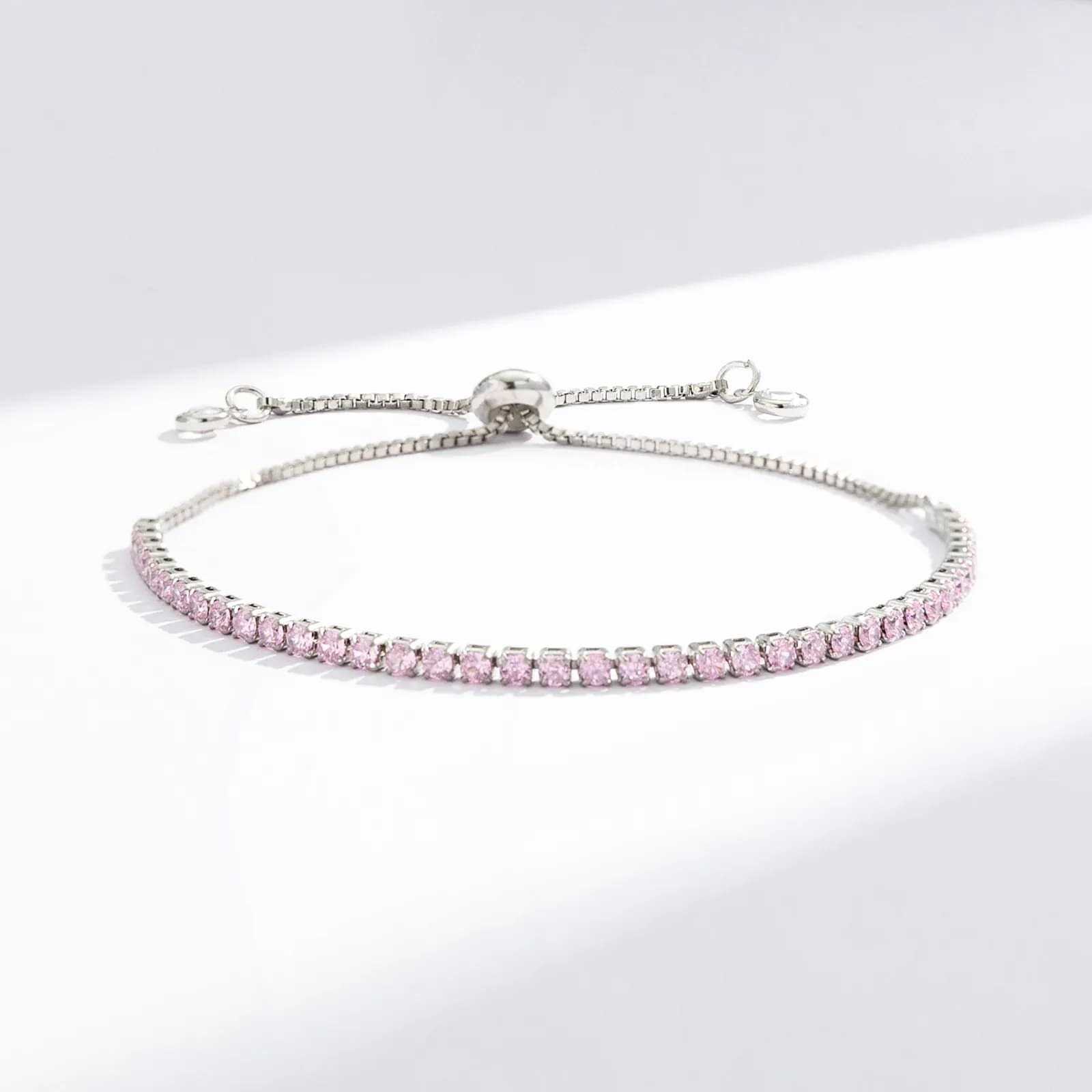 Silverfärgat tennisarmband, ljusrosa glasstenar - Justerbar
