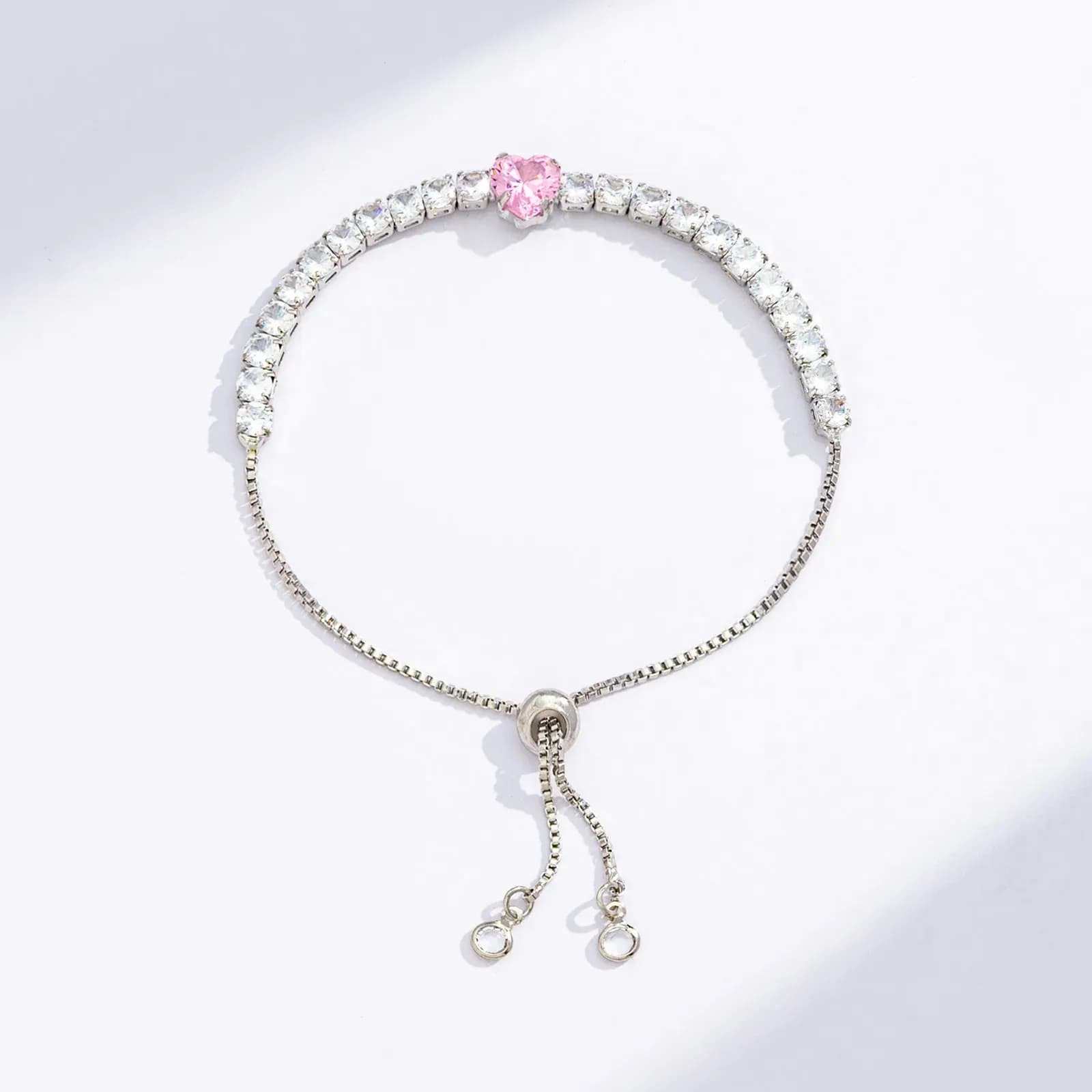 Silverfärgat tennisarmband, rosa hjärta - Justerbar