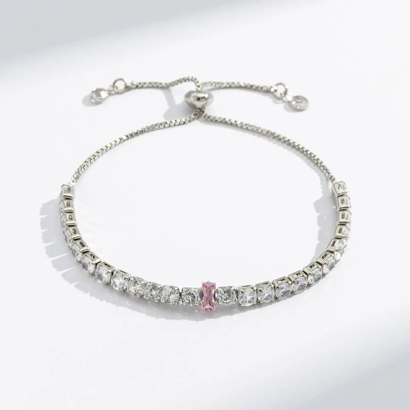 Silverfärgat tennisarmband, rosa rektangulär glassten - Justerbar