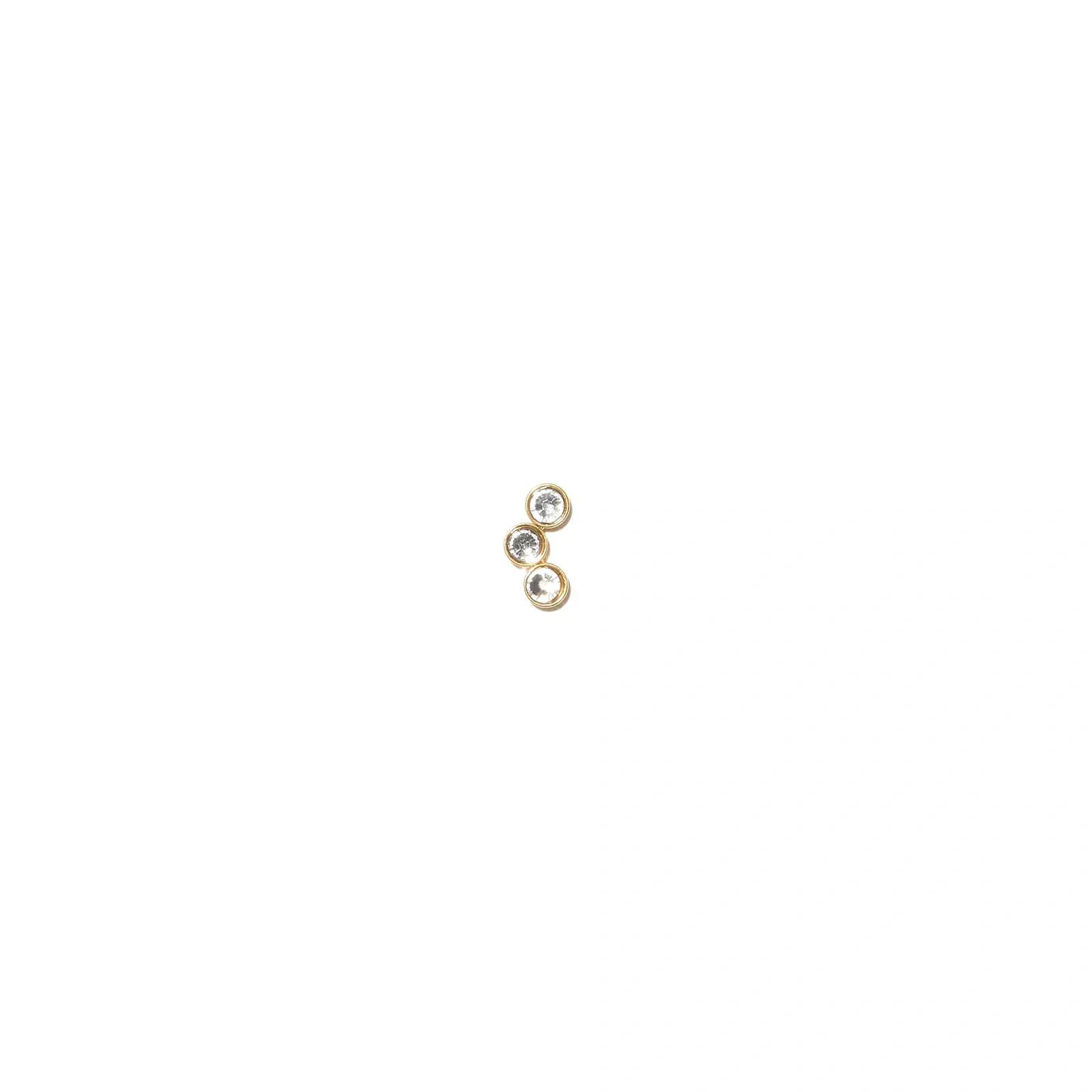 Guldfärgad Ear Piercing i titanlegering - stud, tre stenar