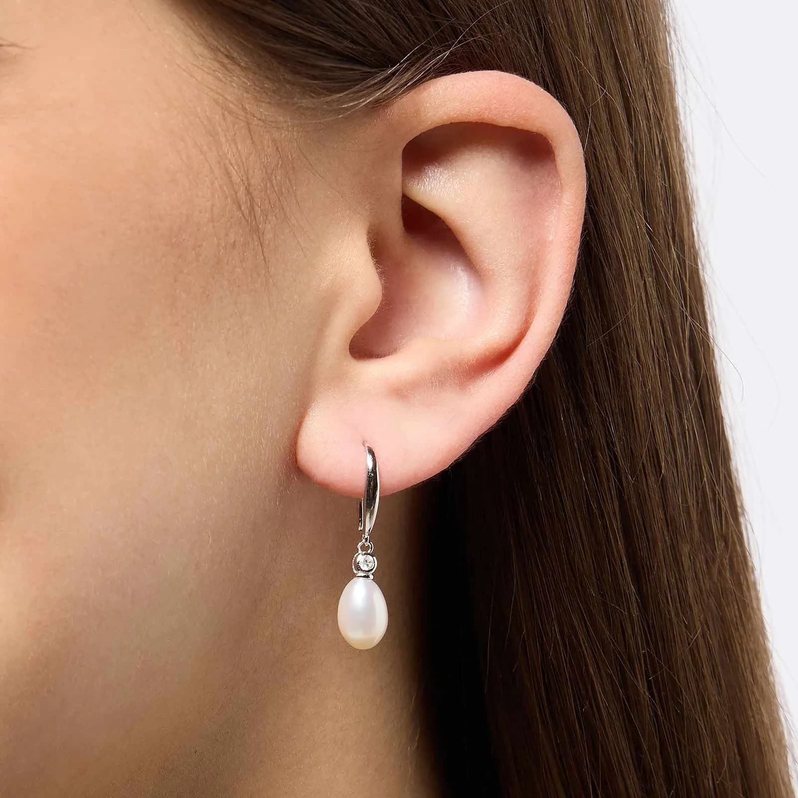 Örhängen i äkta silver - bågar, hängande ovala Shell pearls 2