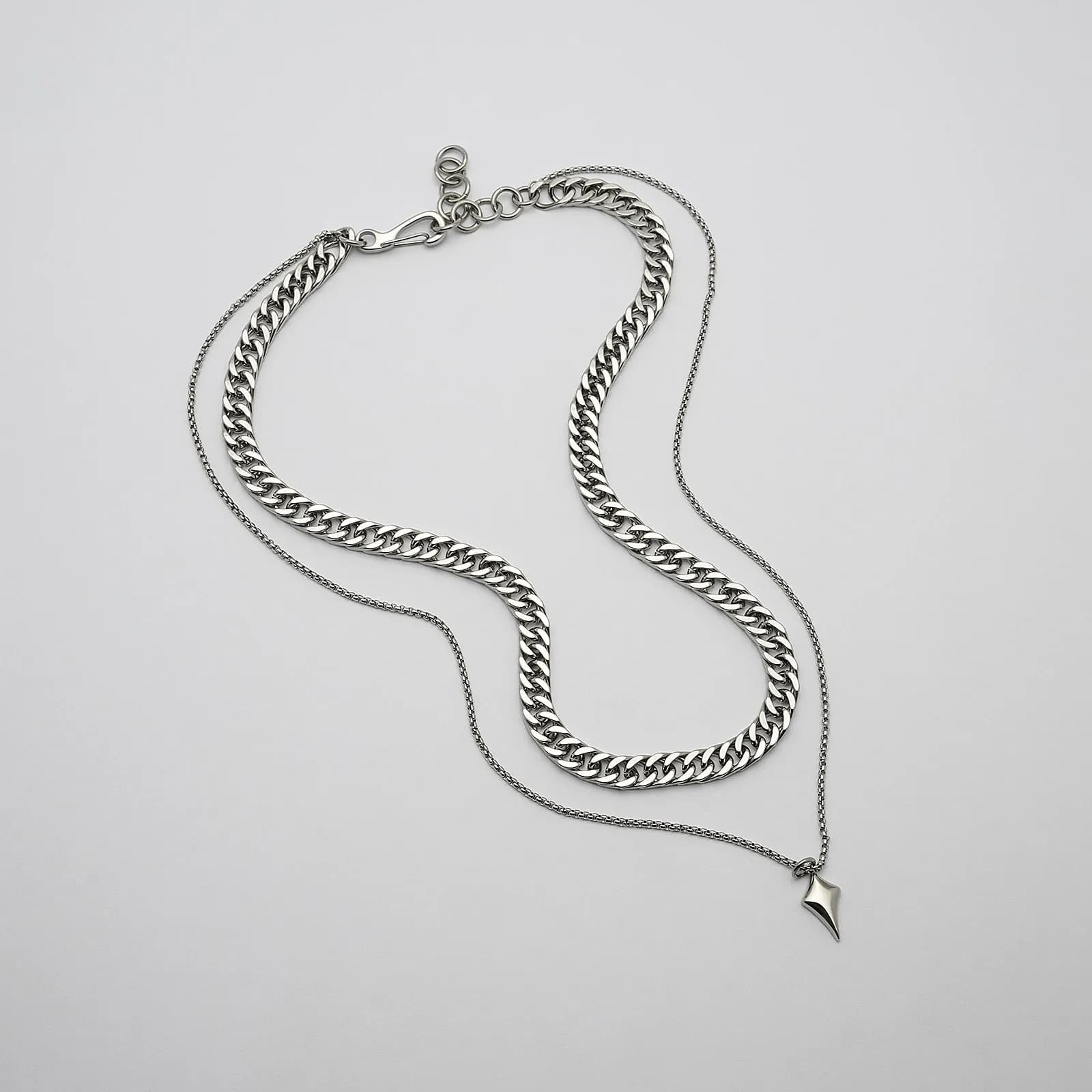 Halsband i stål, dubbelkedja med pil- 50/57+5 cm
