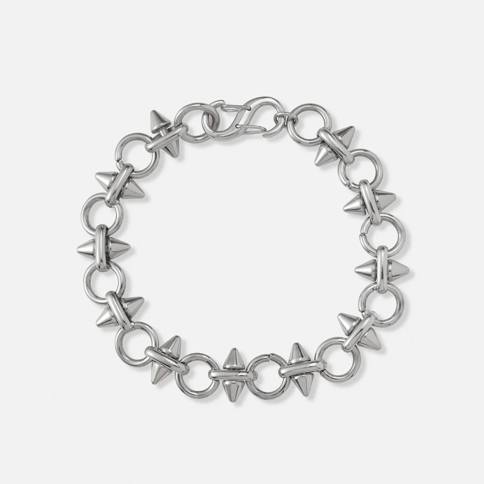 Stålarmband med nitar och ringar - 22cm