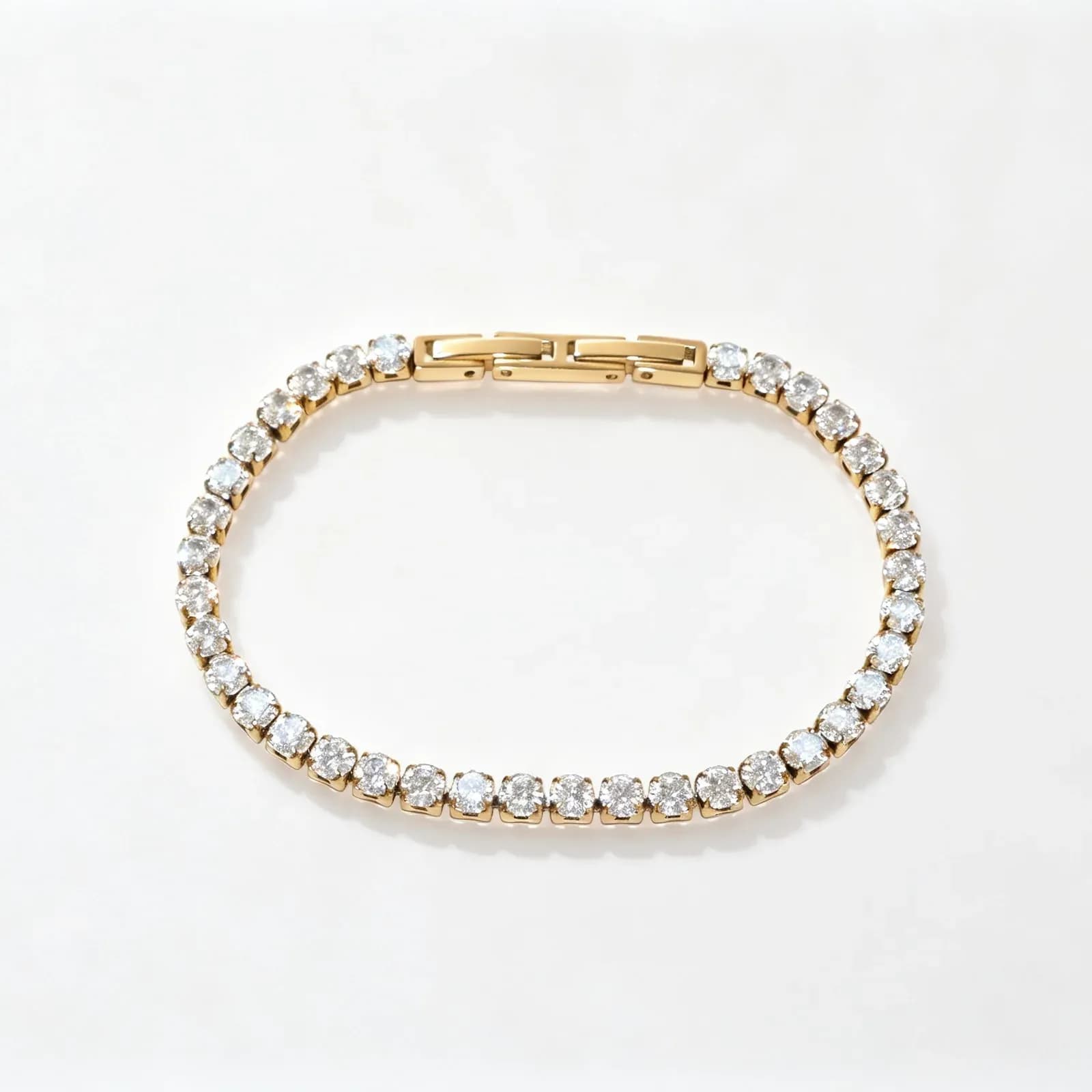 Guldpläterat stålarmband, tennisarmband med 4 mm cubic zirconia - 16+3,4 cm