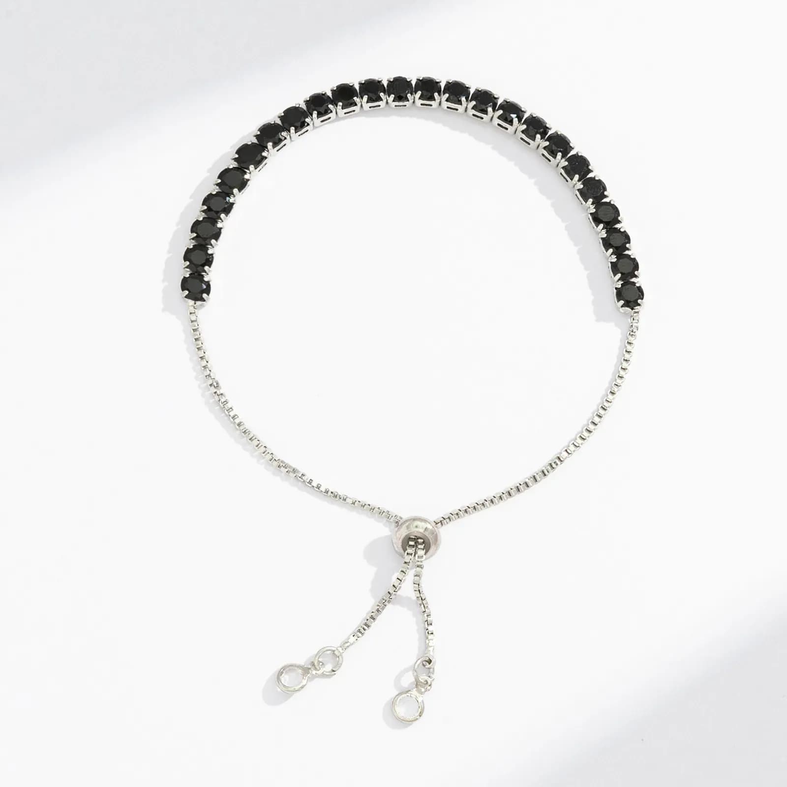 Silverfärgat tennisarmband, svarta glasstenar - Justerbar