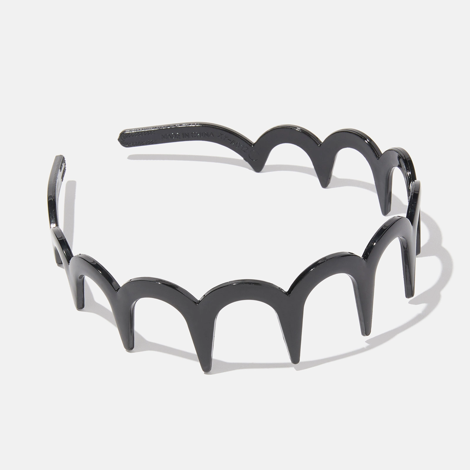 Diadem vågigt - svart plast