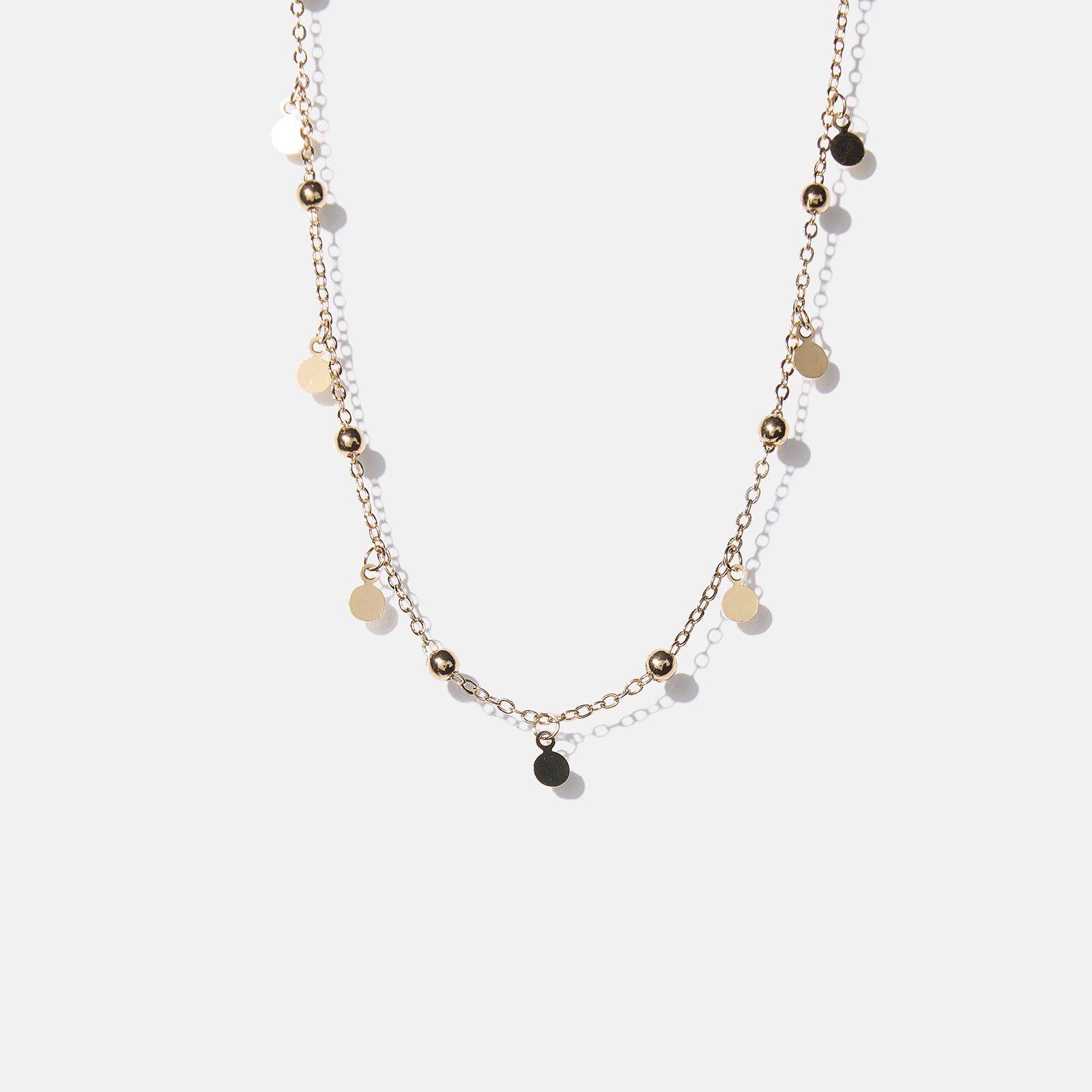 Guldfärgat halsband – brickor & kulor 42+5cm