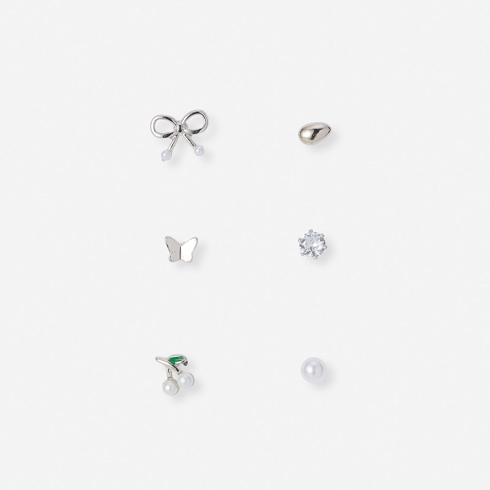 6 silverfärgade studs - olika motiv 1