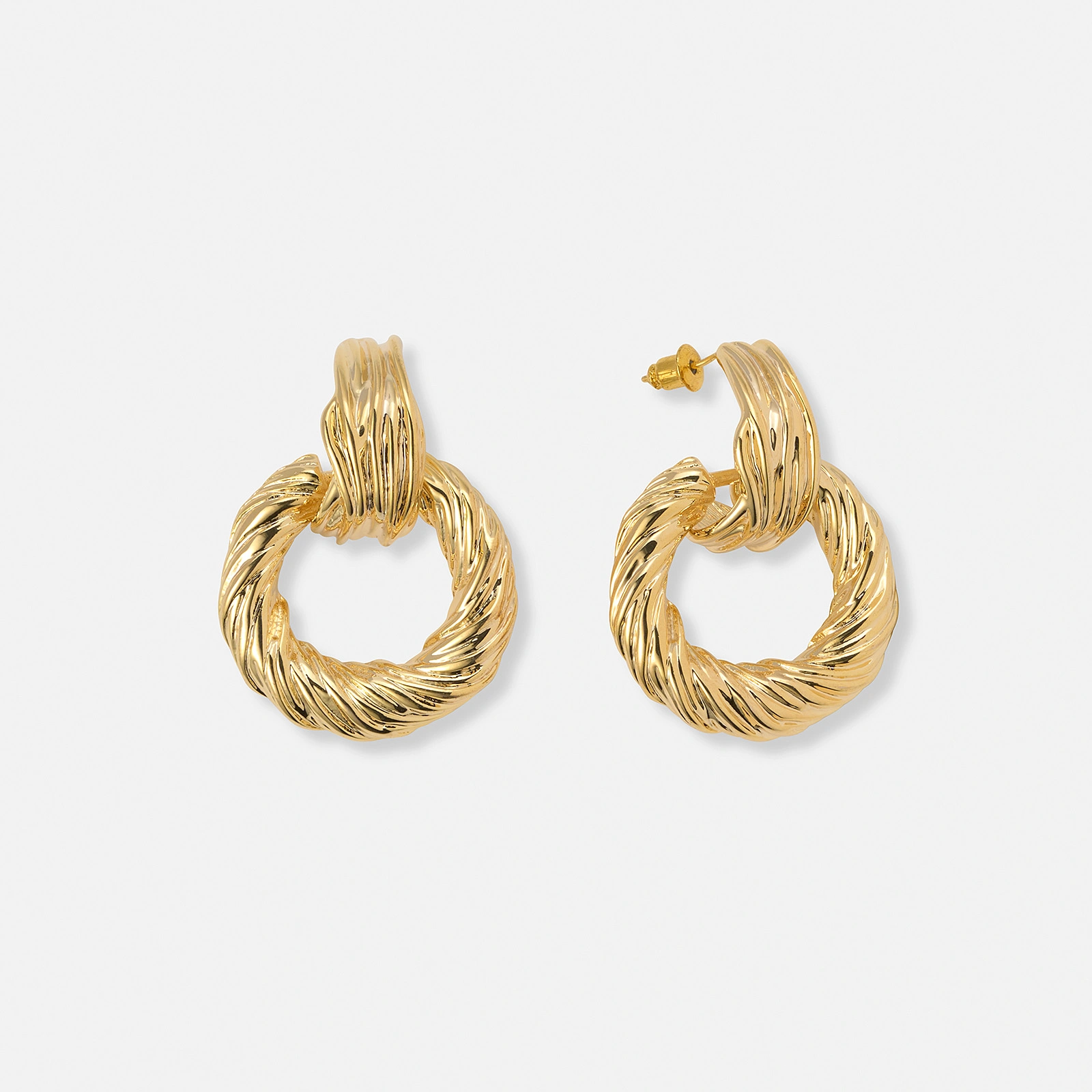 Guldf&auml;rgade &ouml;rh&auml;ngen vridna ringar - 40x30 mm