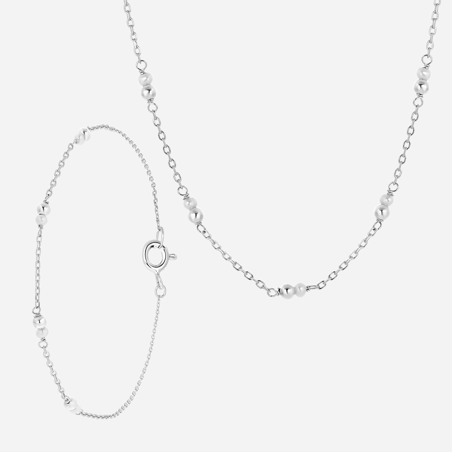 Set i rhodinerat silver -halsband och armband med s&ouml;tvattensp&auml;rlor