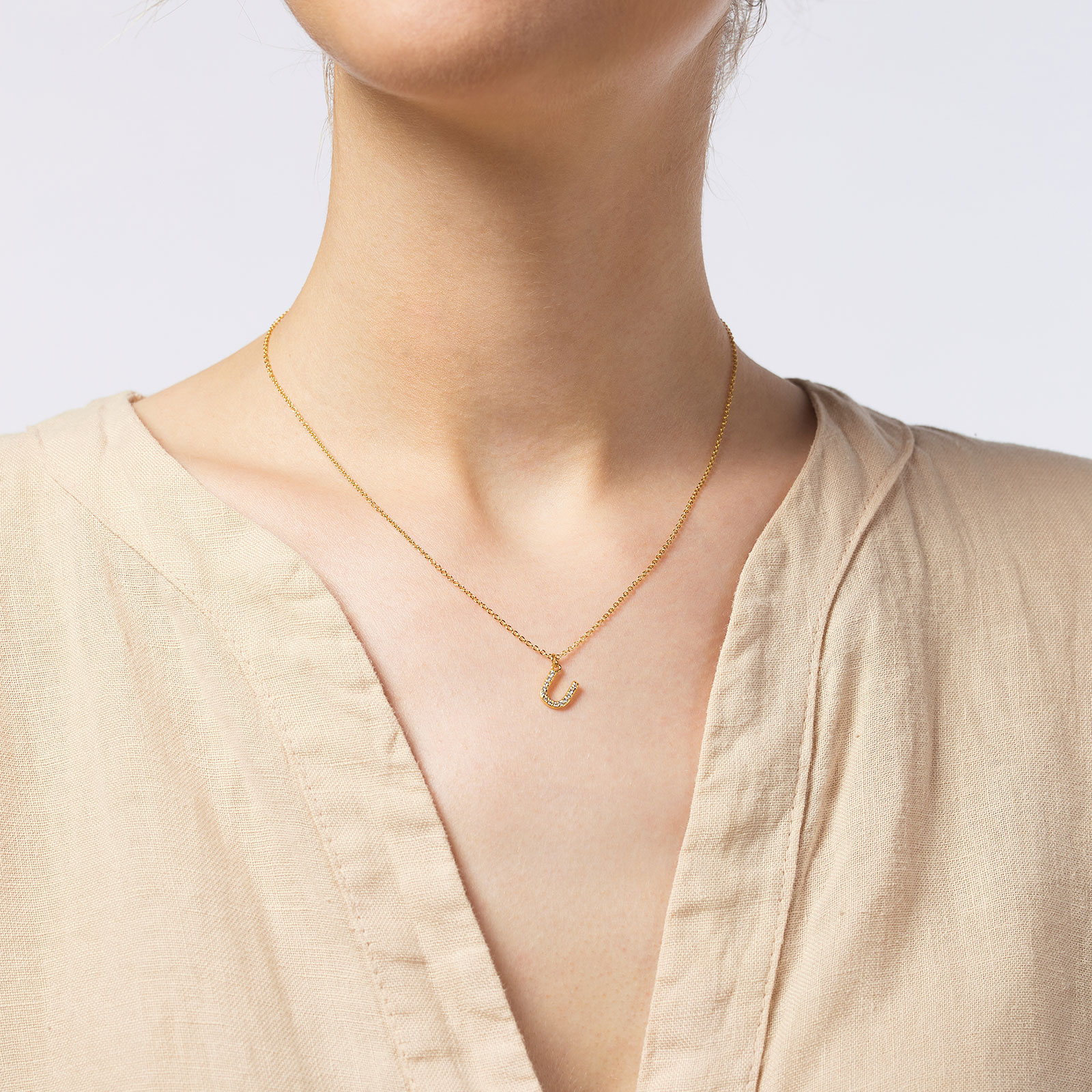 Guldpläterat halsband bokstav U - 42+3 cm