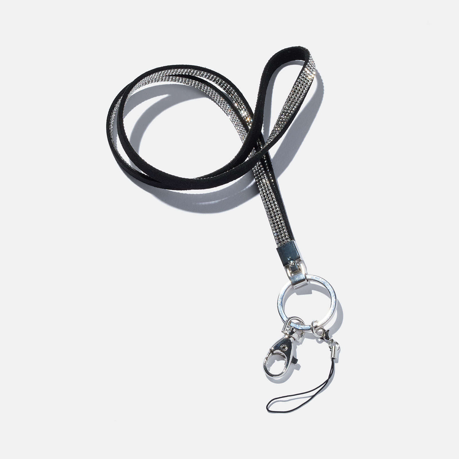 Nyckelring , svart med vitt glitter
