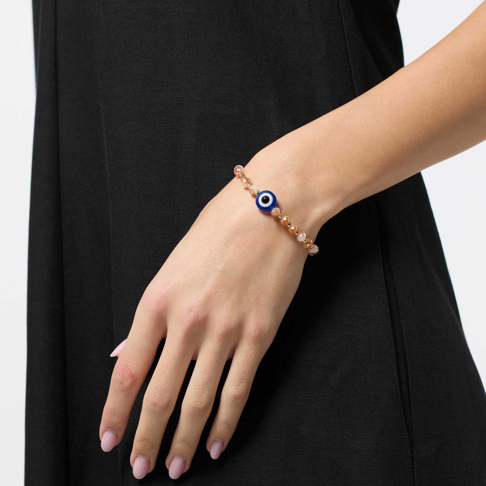 Beige armband med blått öga