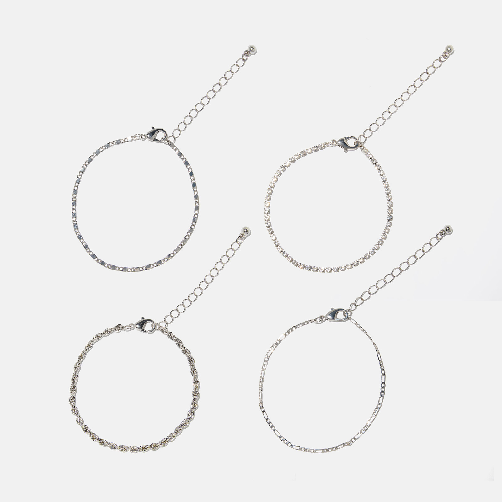 4-pack silverfärgade armband dam