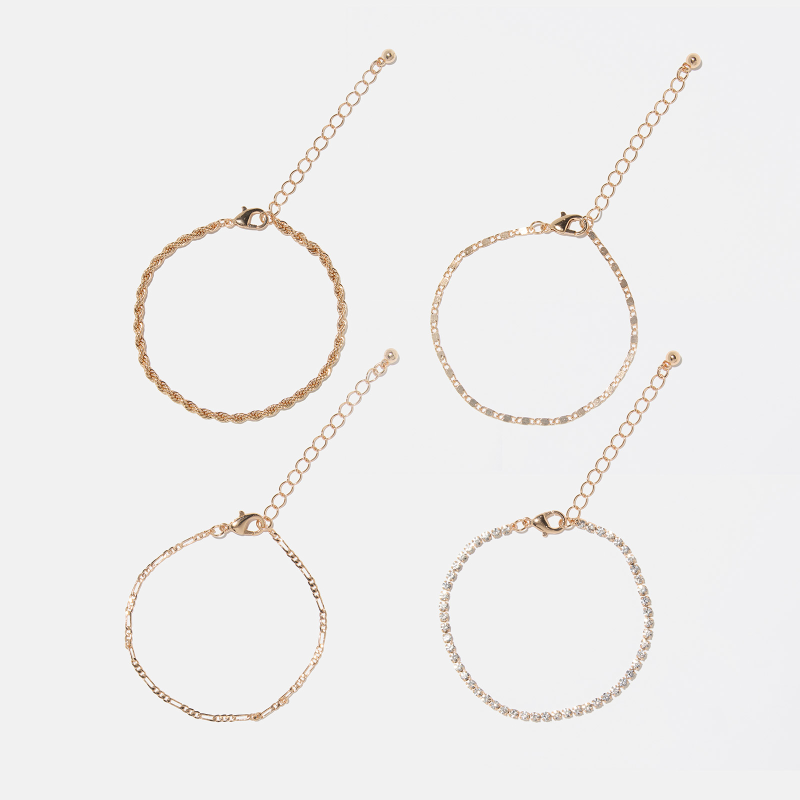 4-pack guldfärgade armband  dam- olika modeller, 18+5 cm