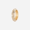 Guldfärgad ring med vita stenar
