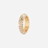 Guldfärgad ring med vita stenar