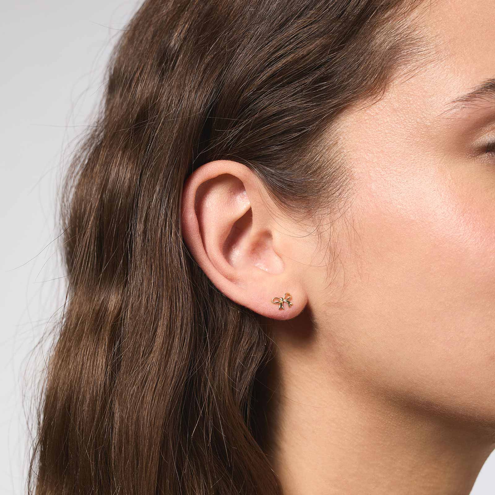 Örhängen 18k guld - rosetter