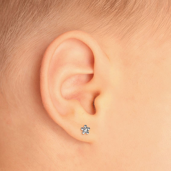 STUDEX - 1st barnörhänge kirurgiskt stål, vit blomma 3mm