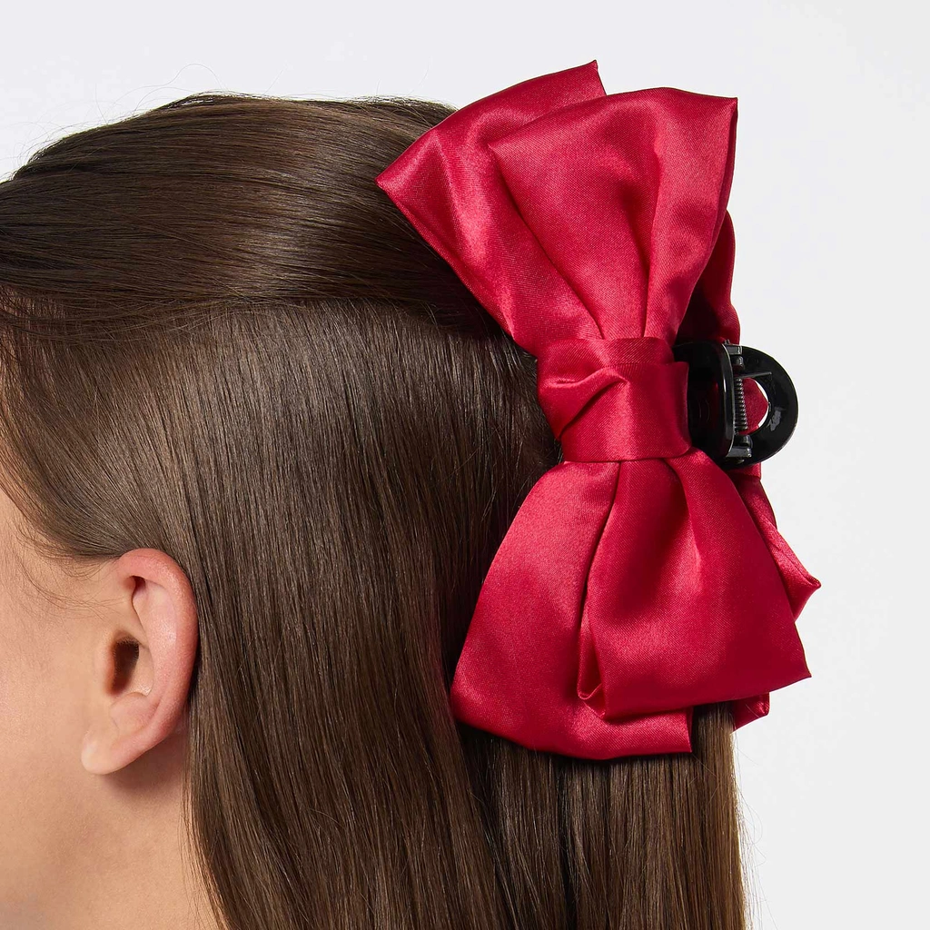 Hårklämma med röd rosett