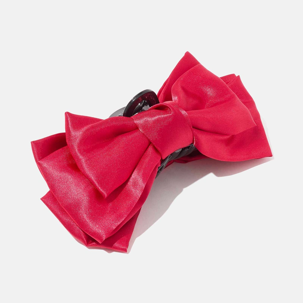 Hårklämma med röd rosett