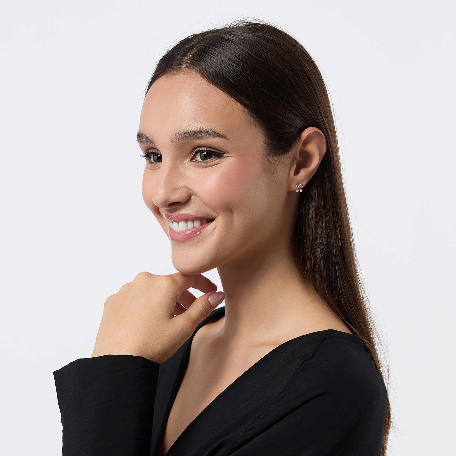 Örhängen i äkta silver - rosetter med sötvattenpärla