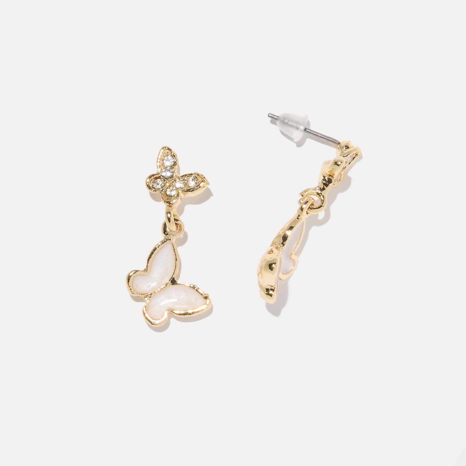 Guldfärgade örhängen - vita hängande fjärilar