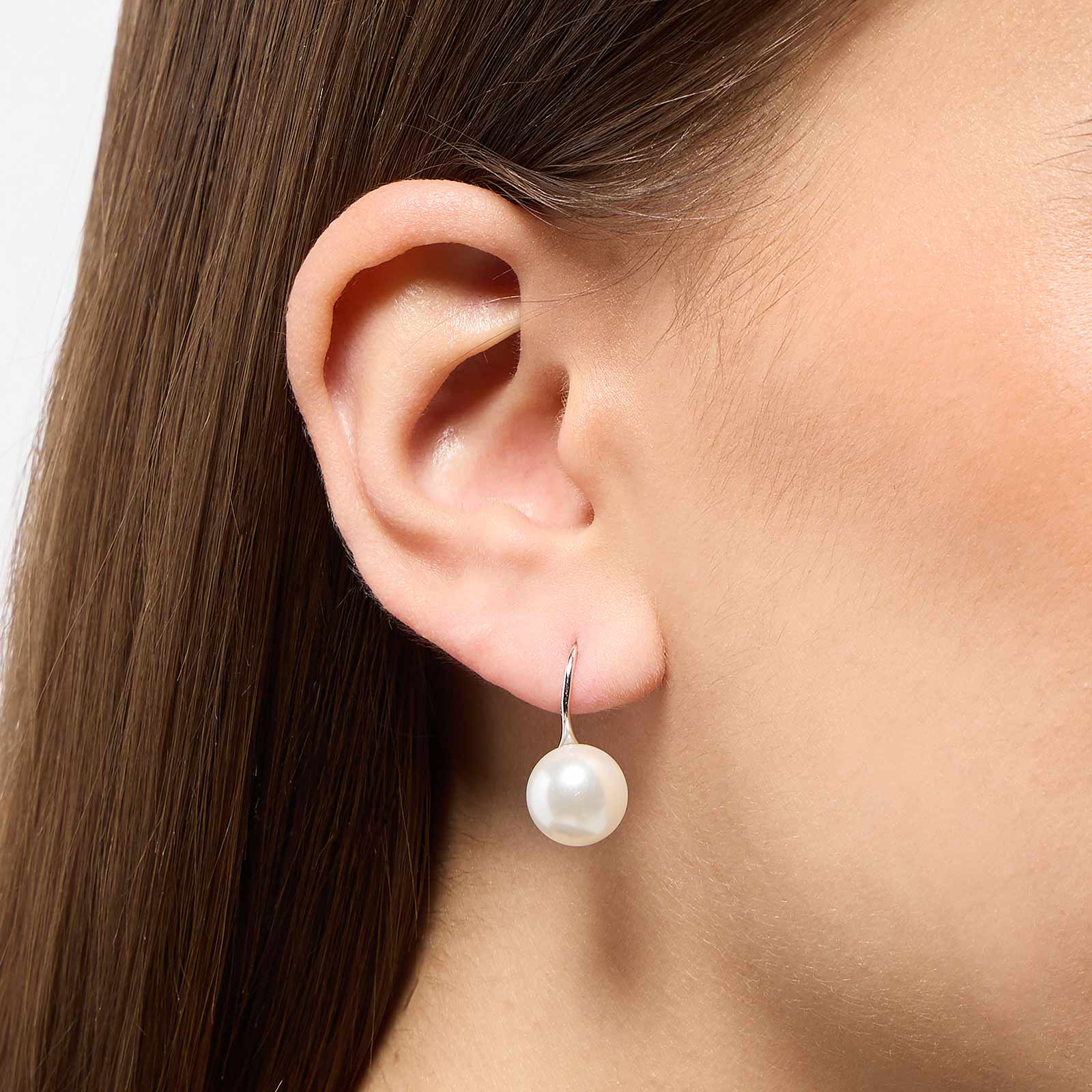 Örhängen i äkta silver - bågar, vita Shell Pearls