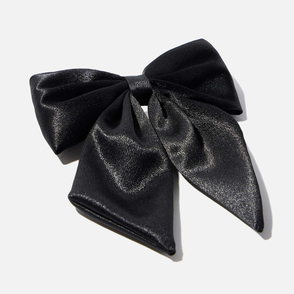 Hårklämma med svart rosett