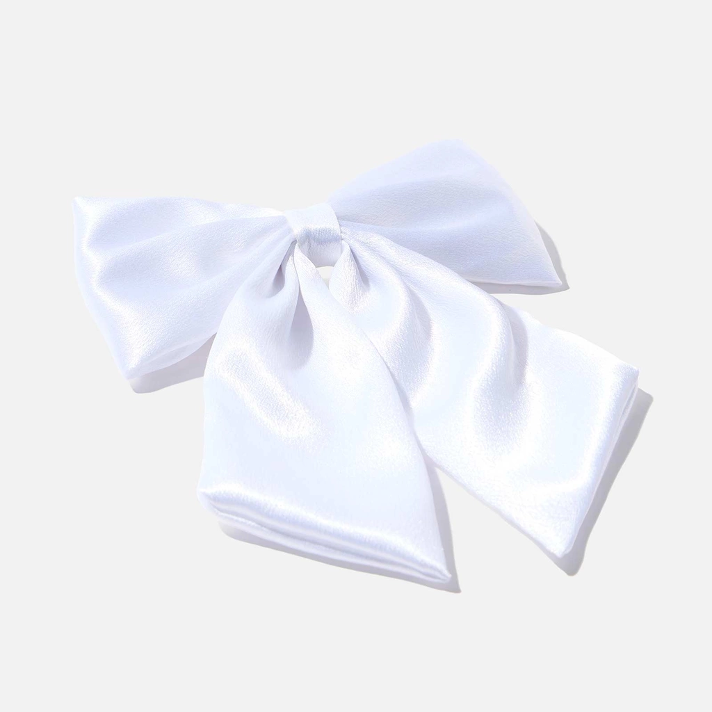 Hårklämma med vit rosett