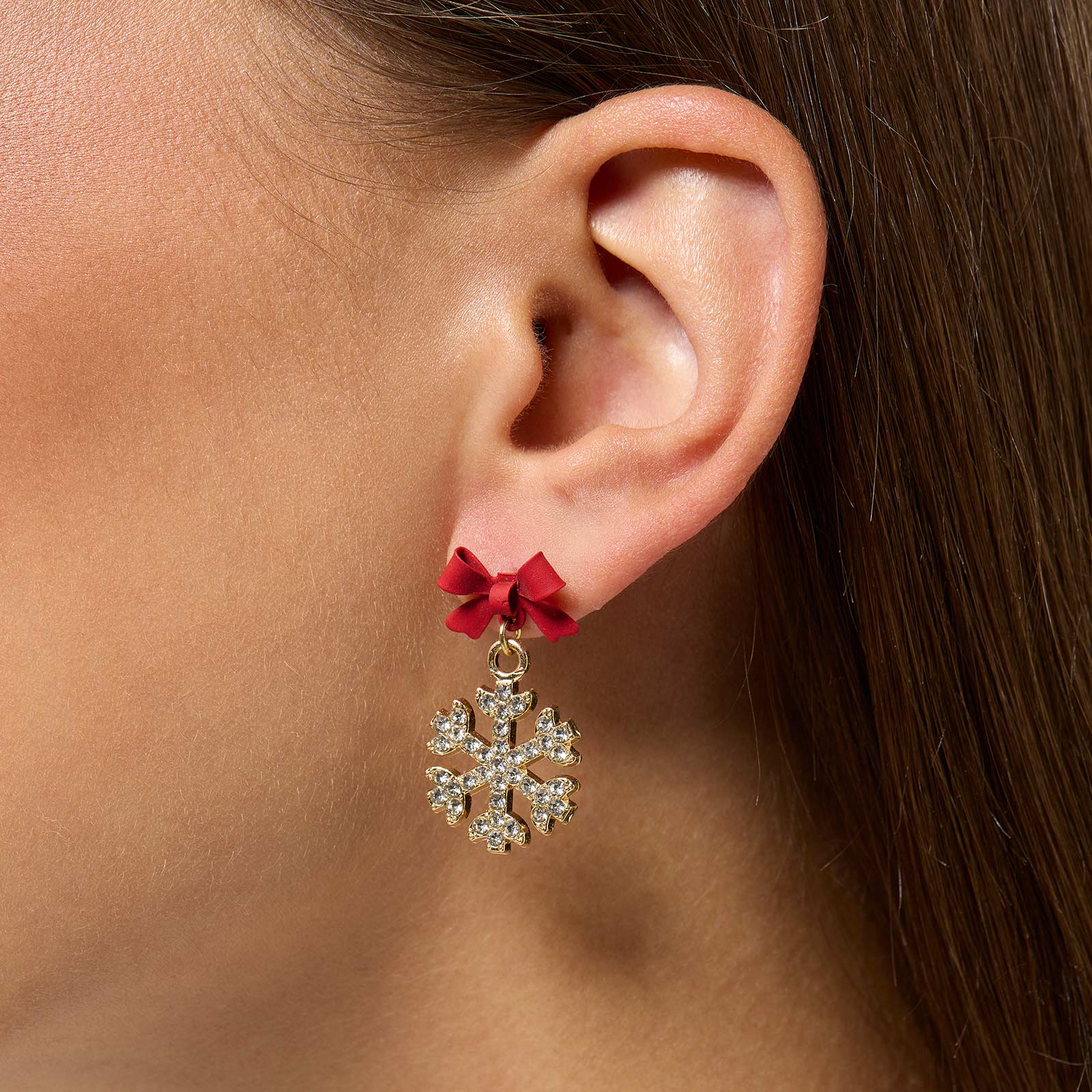 Guldfärgade örhängen - rosetter & snöflingor Guldfärgade örhängen - rosetter & snöflingor