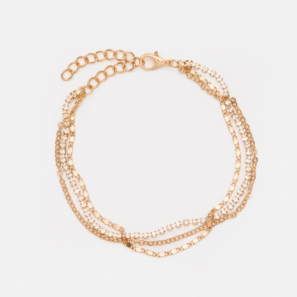 Guldfärgad fotlänk, vita stenar - tre länkar, 19+5 cm