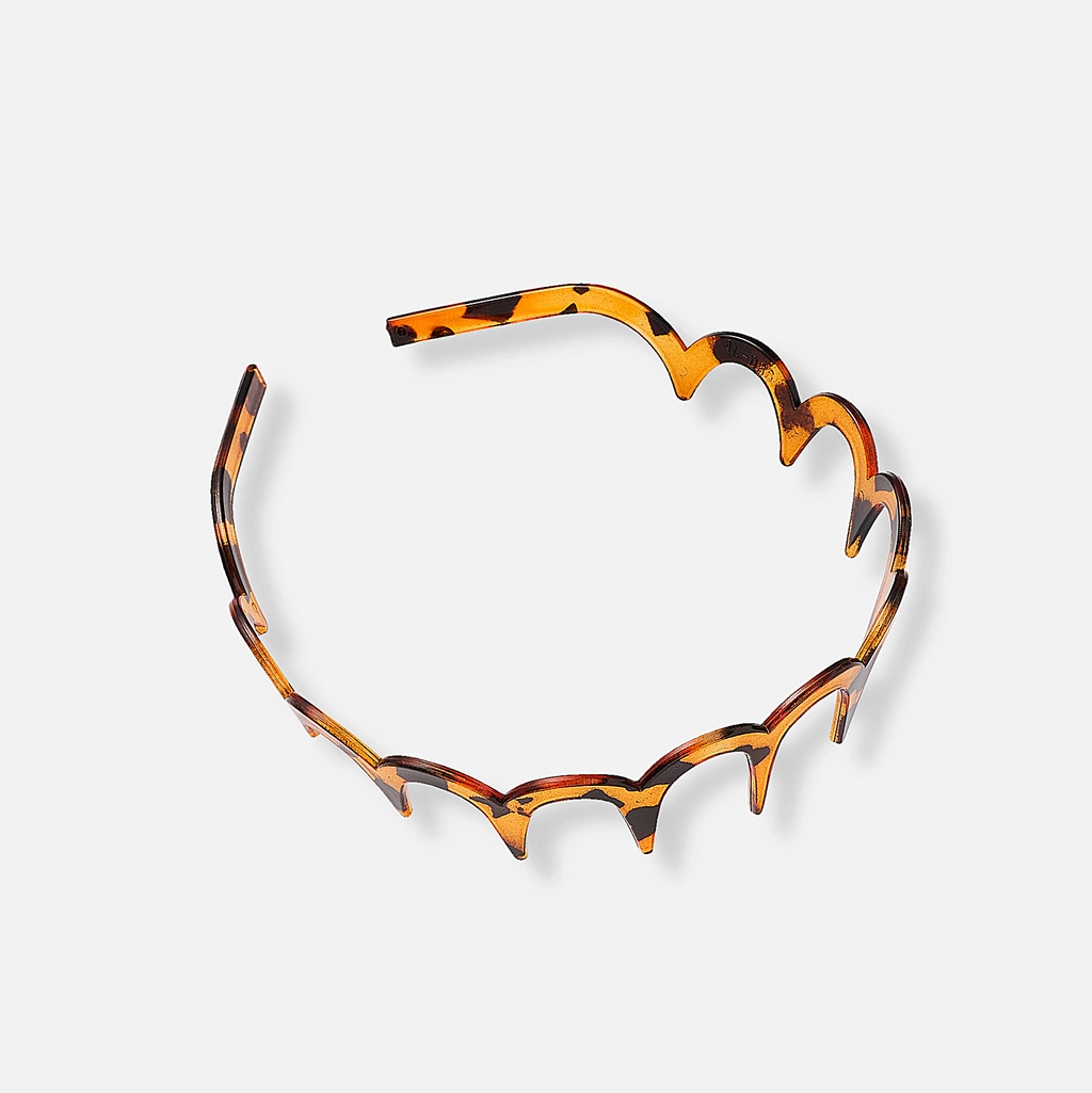 Brunmelerat diadem med piggar