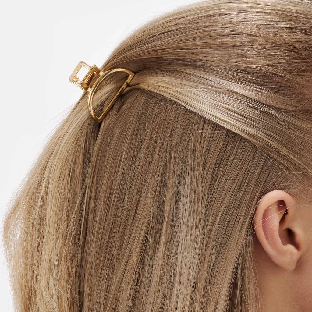 2-pack guldfärgade rundade hårklämmor - 4cm