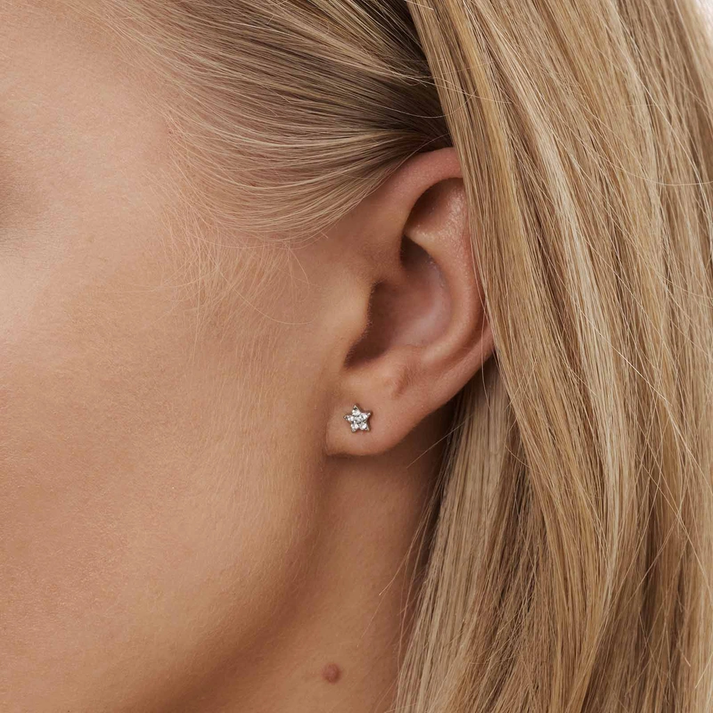 6 silverfärgade studs - olika motiv 2