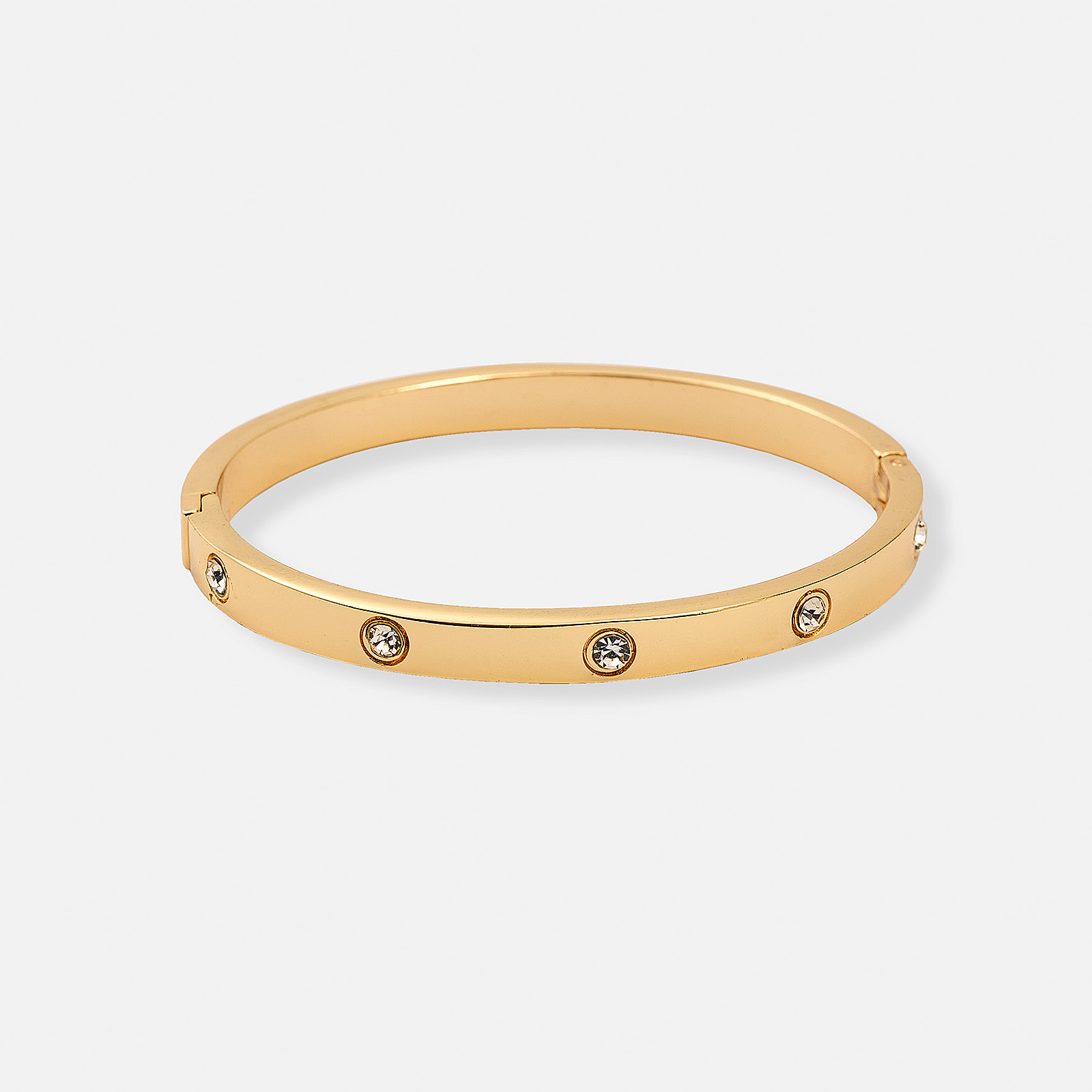 Guldfärgad bangle med vita stenar - 60mm