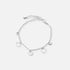 Silverfärgat armband, ringar och brickor - 17+5 cm
