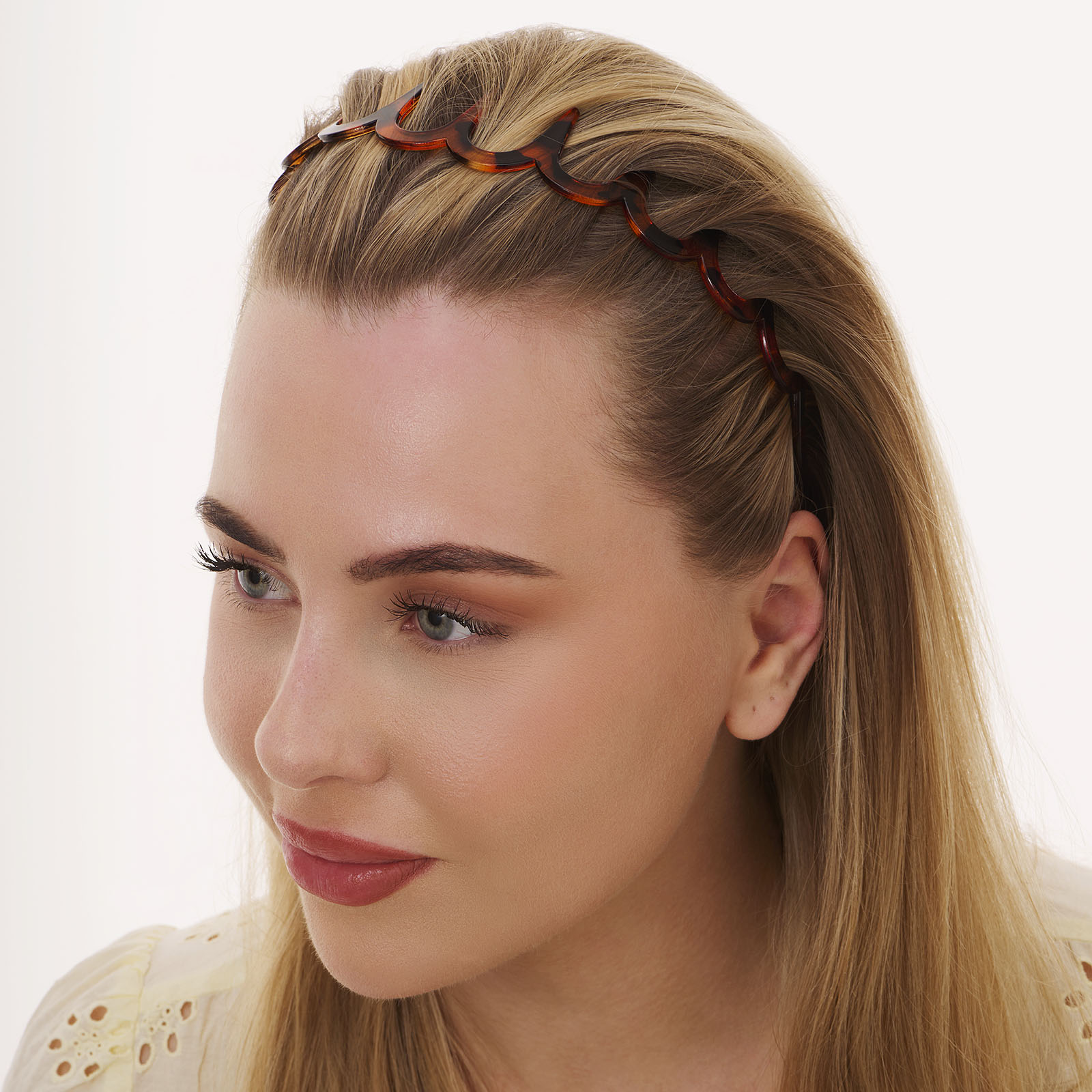 Brunmelerat diadem med piggar