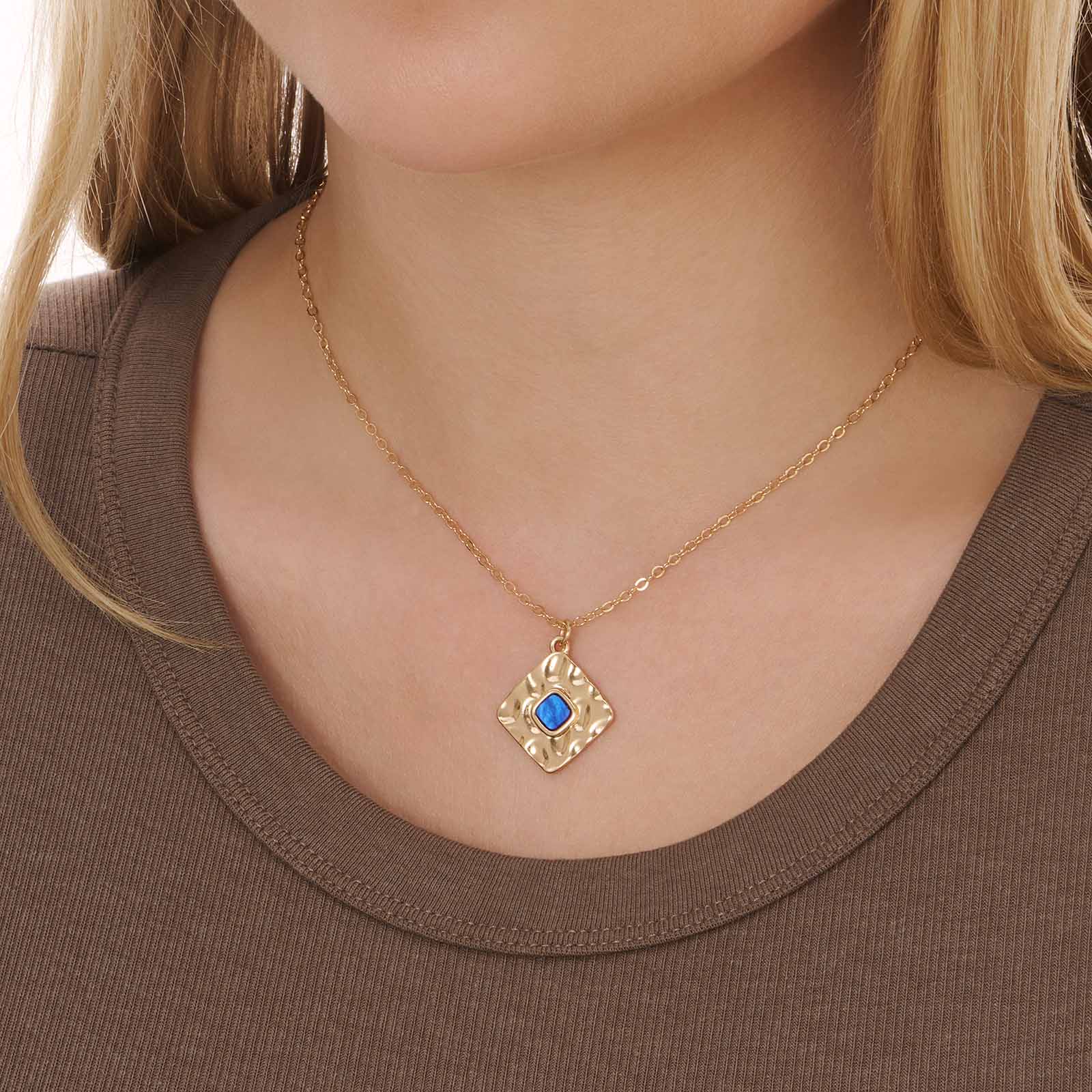 Guldfärgat halsband, blå sten, 42+7cm