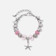 Silverfärgat armband, rosa detaljer & sjöstjärna - 18+5 cm