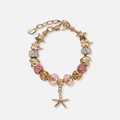 Guldfärgat armband, rosa detaljer & sjöstjärna - 18+5 cm