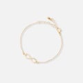 Guldfärgat armband, infinitysymbol - 17+5 cm