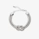 Silverfärgat armband, dubbel ormkedja m. knut - 18+5 cm.