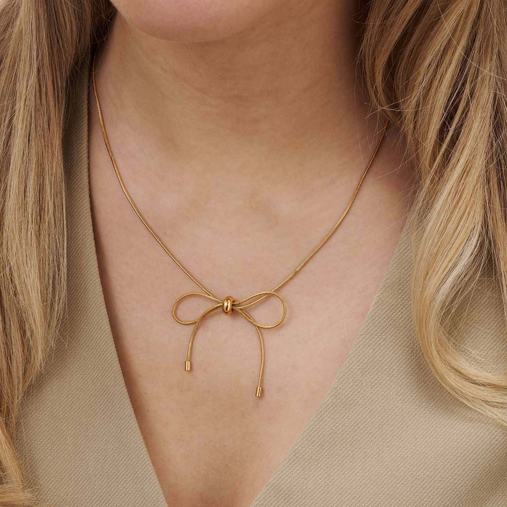 Guldfärgat halsband, ormkedja m rosett, 43+7cm