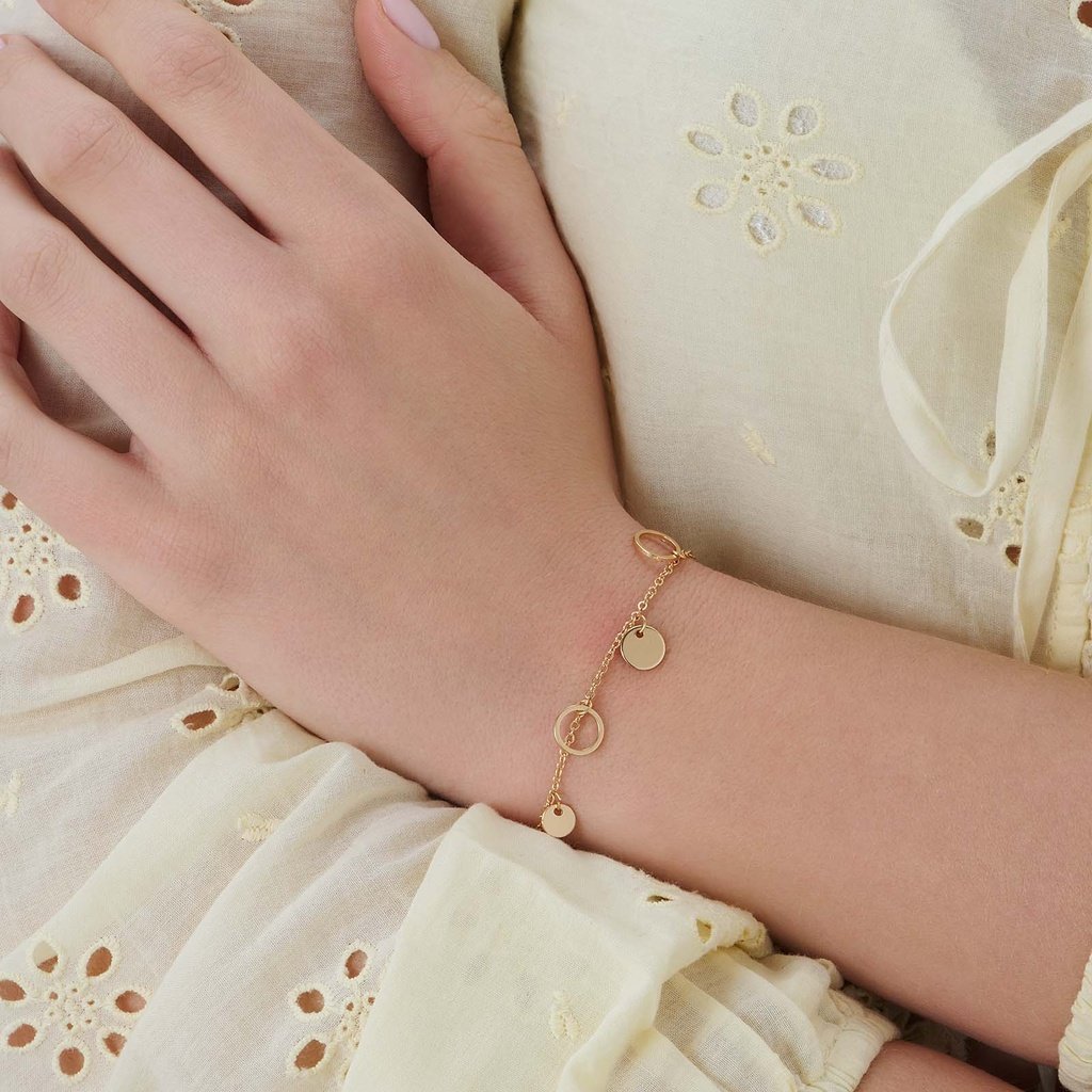 Guldfärgat armband, ringar och brickor - 17+5 cm