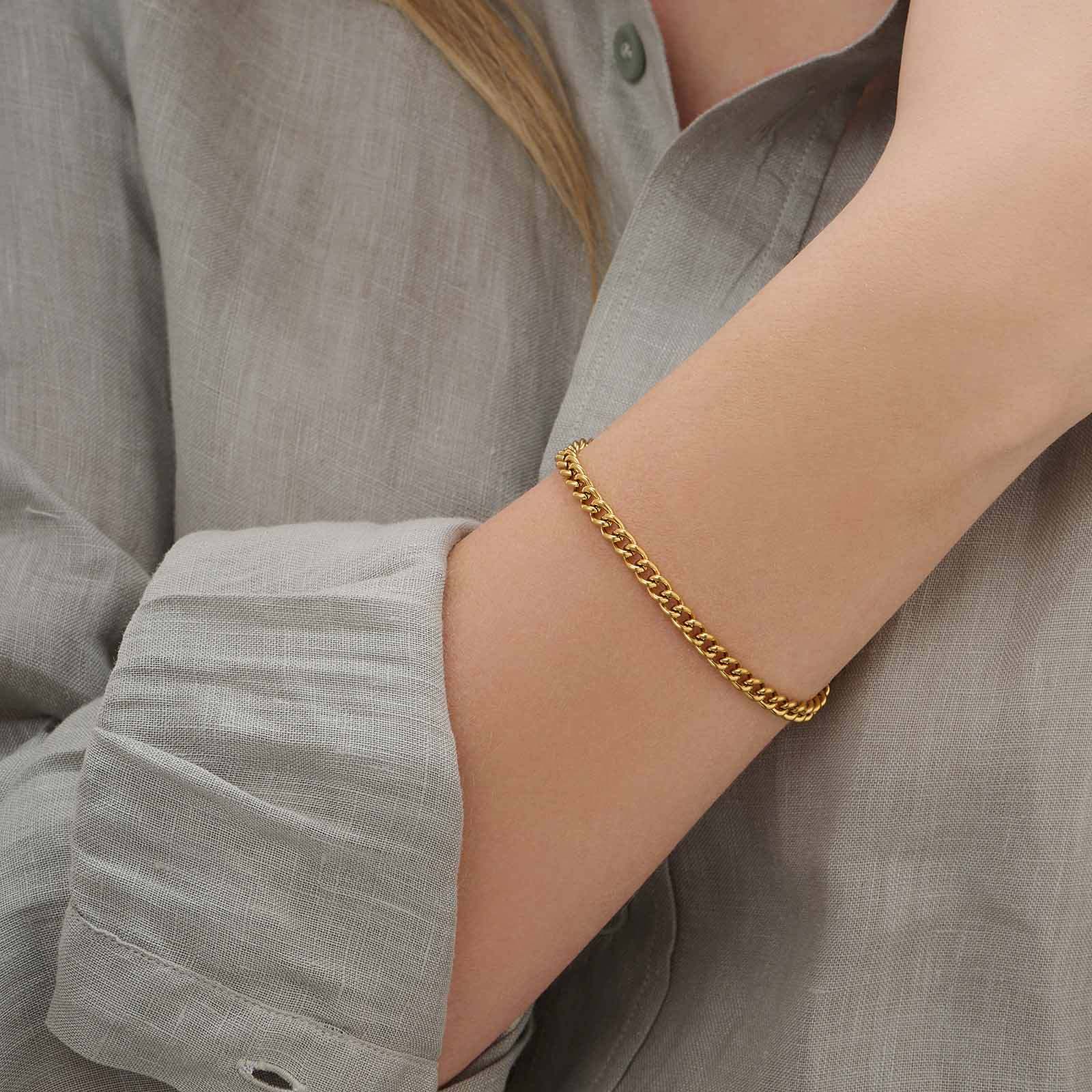 Guldpläterat stålarmband pansarlänk 4 mm