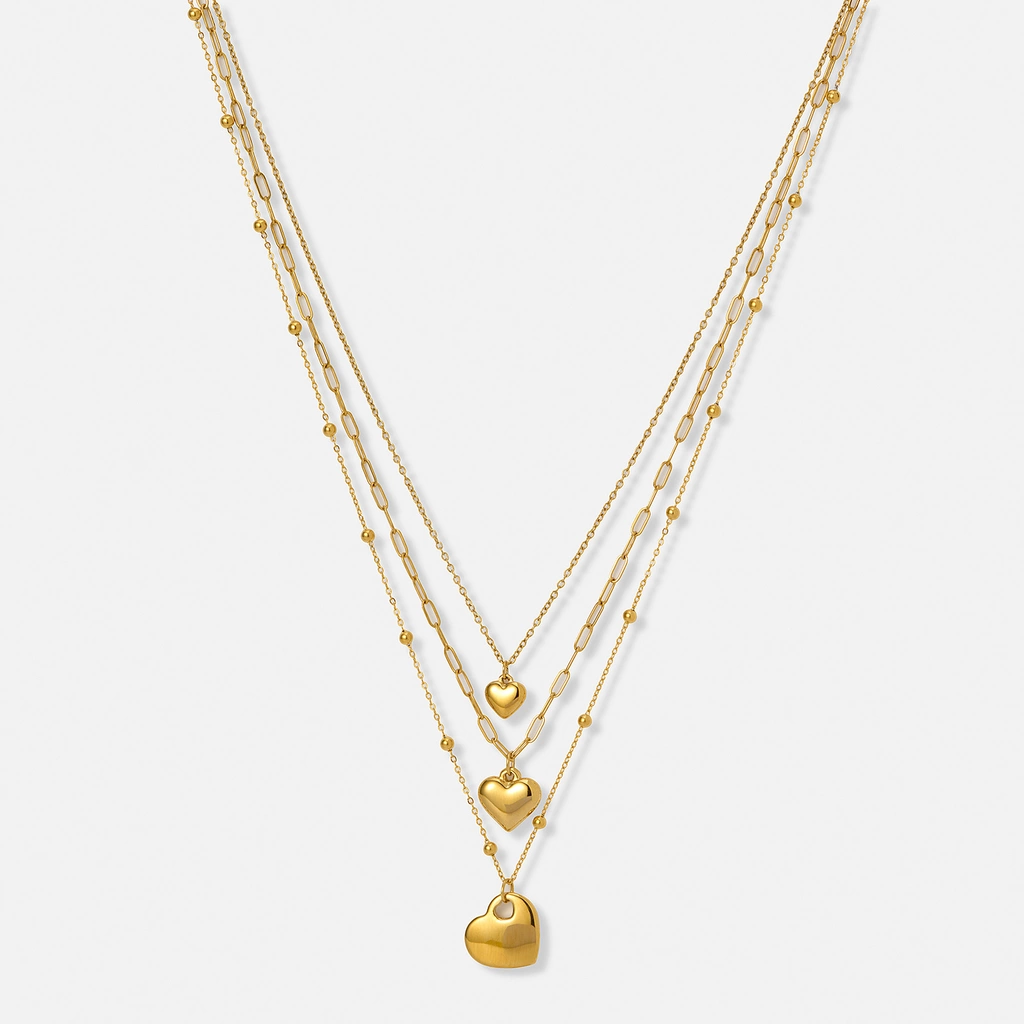 Guldpläterat stålhalsband, tre kedjor med hjärtan - 43-52 cm